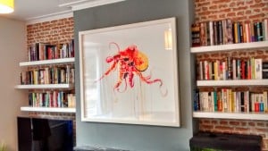 A large Dave White artwork hung on above a chimney breast in Brighton
