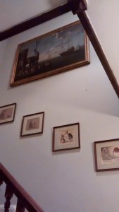Hanging a 17th Century painting above stairs in a house in West Sussex