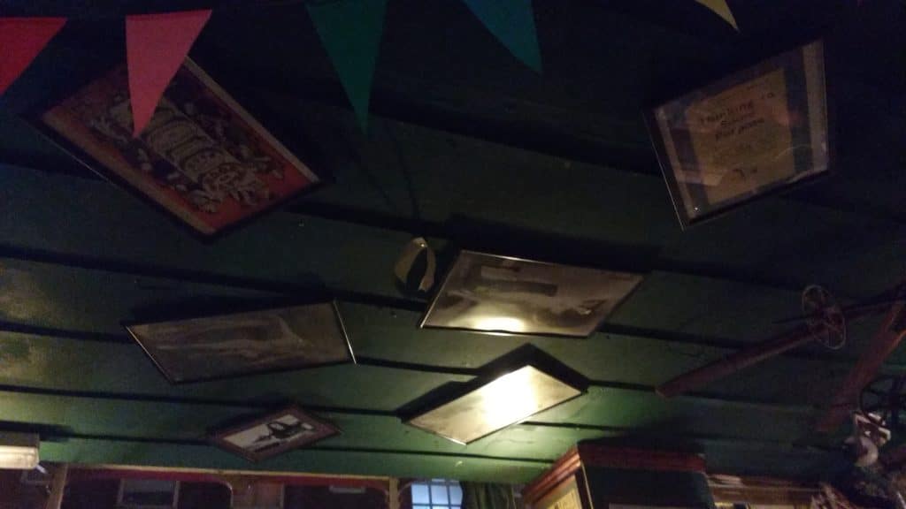 Pictures hung all over the ceiling at the Hand In Hand Pub, Kemp Town, Brighton